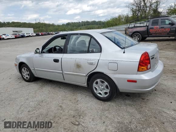 2004 Hyundai Accent GL с VIN KMHCG45C94U515186, выставлен на аукционе Copart как лот 52697284 с пробегом 49 236 миль миль и Списание • Salvage title. История ставок и продаж доступна на DreamBid. Изображение 2.