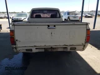 ✅ 1983 Nissan 720 • VIN: JN6ND01S5DW007004 • Lot: 60468475. Wystawiony na Copart z przebiegiem 276 470 mil. Bezpłatny archiwum sprzedaży aukcyjnych z USA i szczegółowy raport historii pojazdu na DreamBid. Zdjęcie 6.