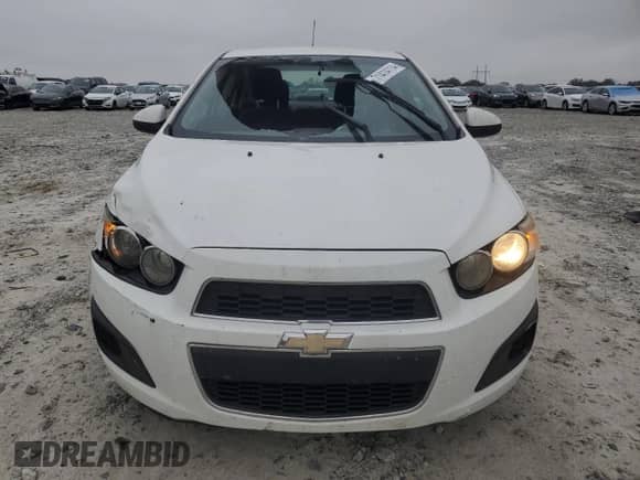 2015 Chevrolet Sonic LT z VIN 1G1JC5SHXF4103013, wystawiony jako Copart lot #71414114 z przebiegiem 169 575 mil mil oraz Szkoda całkowita • Salvage title. Historia ofert i sprzedaży dostępna na DreamBid. Obrazek 5.