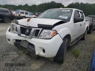 2012 Nissan Frontier SV with VIN 1N6AD0ER9CC457518, listed as a Copart auction lot 55104035 with 214,798 mi miles and Salvage title. Bid and sale history available at DreamBid. Image 1.