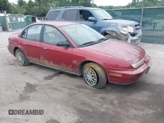 ✅ 1996 Saturn SL • VIN: 1G8ZK5277TZ101040 • Lot: 42964989. Listed on IAAI with 151,796 mi. Free auction sales archive from the USA and detailed vehicle history report at DreamBid. Image 1.