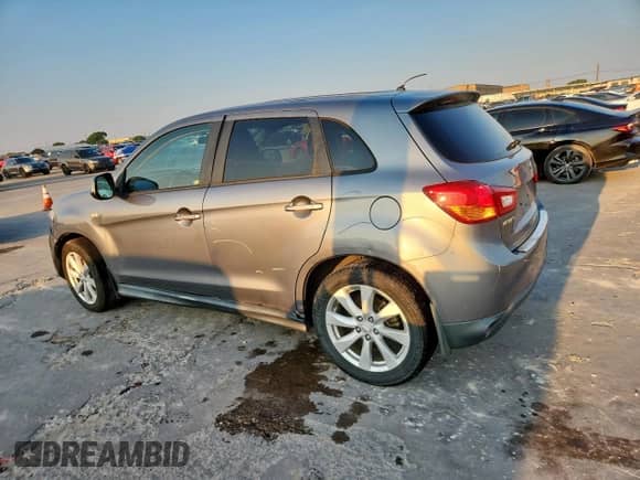 2013 Mitsubishi Outlander ES z VIN 4A4AP3AU2DE011084, wystawiony jako Copart lot #71807855 z przebiegiem 141 460 mil mil oraz Szkoda całkowita • Salvage title. Historia ofert i sprzedaży dostępna na DreamBid. Obrazek 2.