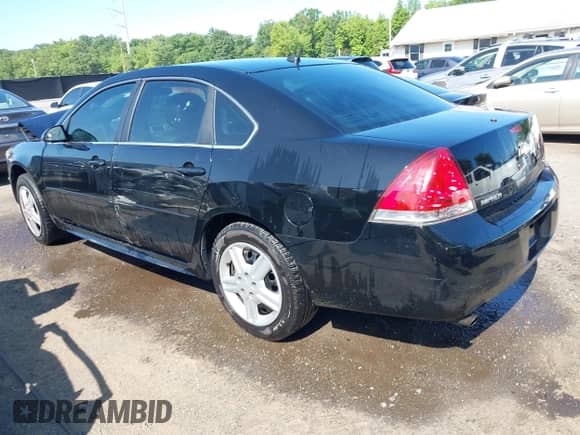 2014 Chevrolet Impala Police Police z VIN 2G1WD5E32E1152784, wystawiony jako IAAI lot #42370670 z przebiegiem 150 931 mil mil oraz . Historia ofert i sprzedaży dostępna na DreamBid. Obrazek 3.