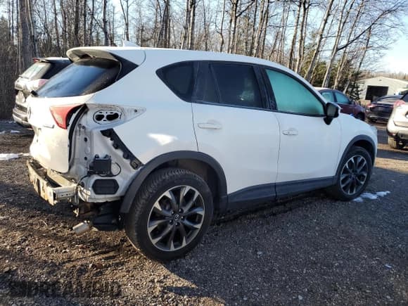 ✅ 2016 Mazda CX-5 Grand Touring • VIN: JM3KE4DY7G0782851 • Лот: 93342055. Опубликован ранее на Copart с пробегом 114 722 миль. Бесплатный доступ к архиву аукционных продаж из США и подробный отчёт об истории автомобиля на DreamBid. Изображение 3.