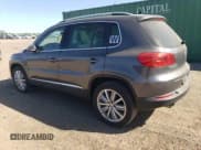 ✅ 2013 Volkswagen Tiguan SE • VIN: WVGAV7AX7DW018388 • Lot: 56188045. Wystawiony na Copart z przebiegiem 98 066 mil. Bezpłatny archiwum sprzedaży aukcyjnych z USA i szczegółowy raport historii pojazdu na DreamBid. Zdjęcie 2.
