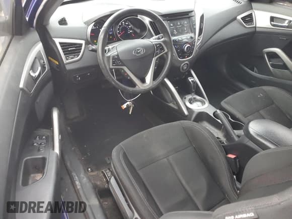 ✅ 2013 Hyundai Veloster w/Gray Int • VIN: KMHTC6AD4DU134318 • Lot: 84050304. Wystawiony na Copart z przebiegiem 129 797 mil. Bezpłatny archiwum sprzedaży aukcyjnych z USA i szczegółowy raport historii pojazdu na DreamBid. Zdjęcie 8.