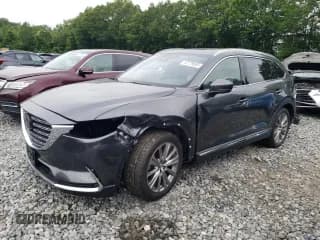 ✅ 2022 Mazda CX-9 Signature • VIN: JM3TCBEY0N0618478 • Лот: 57779865. Опубликован ранее на Copart с пробегом 19 633 миль. Бесплатный доступ к архиву аукционных продаж из США и подробный отчёт об истории автомобиля на DreamBid. Изображение 1.