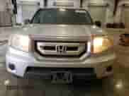 2010 Honda Pilot LX with VIN 5FNYF4H24AB030362, listed as a Copart auction lot 71767715 with 208,261 mi miles and Salvage title. Bid and sale history available at DreamBid. Image 5.