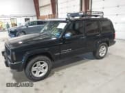 ✅ 2001 Jeep Cherokee Sport • VIN: 1J4FF58S11L562933 • Lot: 41944672. Listed on IAAI with 163,078 mi. Free auction sales archive from the USA and detailed vehicle history report at DreamBid. Image 2.
