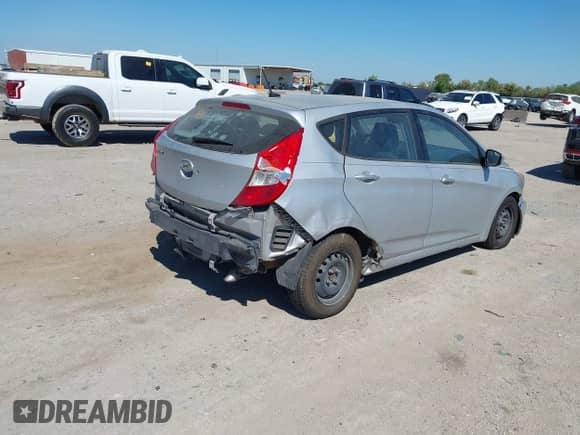 2015 Hyundai Accent GS with VIN KMHCT5AE6FU213107, listed as a IAAI auction lot 43430089 with 131,496 mi miles and . Bid and sale history available at DreamBid. Image 4.