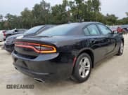 ✅ 2023 Dodge Charger SXT • VIN: 2C3CDXBG5PH663238 • Lot: 90501795. Wystawiony na Copart z przebiegiem 50 017 mil. Bezpłatny archiwum sprzedaży aukcyjnych z USA i szczegółowy raport historii pojazdu na DreamBid. Zdjęcie 3.