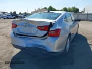 ✅ 2016 Chevrolet Malibu LS • VIN: 1G1ZB5ST9GF340558 • Lot: 42520463. Listed on IAAI with 104,296 mi. Free auction sales archive from the USA and detailed vehicle history report at DreamBid. Image 4.