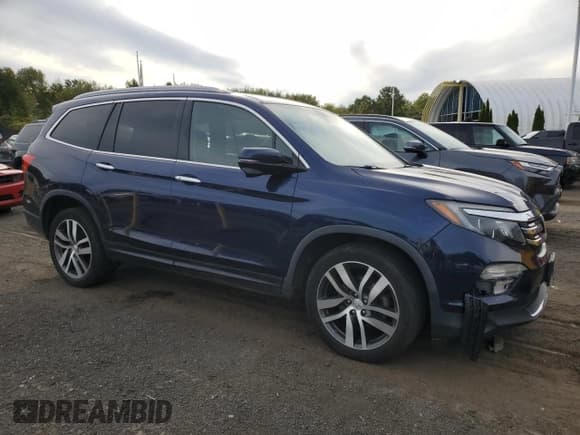 ✅ 2018 Honda Pilot Touring • VIN: 5FNYF6H96JB001776 • Lot: 84729555. Listed on Copart with 95,449 mi. Free auction sales archive from the USA and detailed vehicle history report at DreamBid. Image 4.