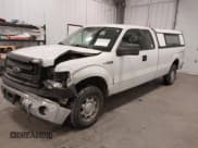 ✅ 2014 Ford F-150 XL • VIN: 1FTFX1EFXEKG20617 • Lot: 41531746. Listed on IAAI with 262,007 mi. Free auction sales archive from the USA and detailed vehicle history report at DreamBid. Image 2.