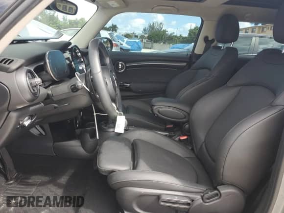 2023 MINI Hardtop Cooper S with VIN WMW53DH04P2T22418, listed as a Copart auction lot 86857795 with 32,004 mi miles and Salvage title. Bid and sale history available at DreamBid. Image 7.