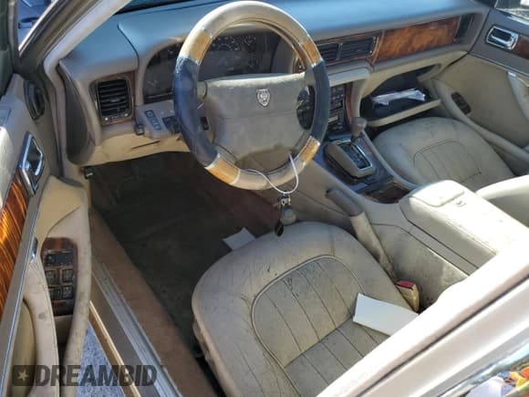 ✅ 1997 Jaguar XJ • VIN: SAJHX6241VC795259 • Lot: 70752854. Listed on Copart with Not provided. Free auction sales archive from the USA and detailed vehicle history report at DreamBid. Image 8.