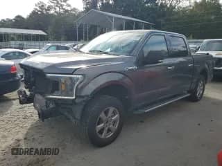 2018 Ford F-150 XL with VIN 1FTEW1CP6JFB62877, listed as a Copart auction lot 82221905 with 118,405 mi miles and Salvage title. Bid and sale history available at DreamBid. Image 1.