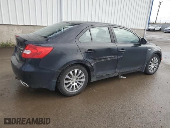 ✅ 2012 Suzuki Kizashi SE • VIN: JS2RF9A32C6100580 • Лот: 91204895. Опубликован ранее на Copart с пробегом 173 714 миль. Бесплатный доступ к архиву аукционных продаж из США и подробный отчёт об истории автомобиля на DreamBid. Изображение 3.