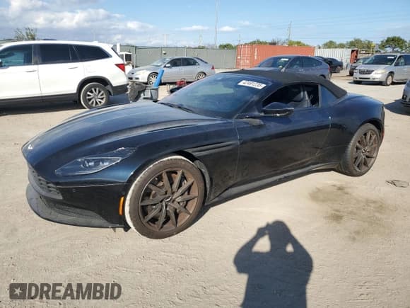 ✅ 2020 Aston Martin DB11 • VIN: SCFRMFCWXLGM08503 • Лот: 42491235. Опубликован ранее на Copart с пробегом Не указан. Бесплатный доступ к архиву аукционных продаж из США и подробный отчёт об истории автомобиля на DreamBid. Изображение 1.