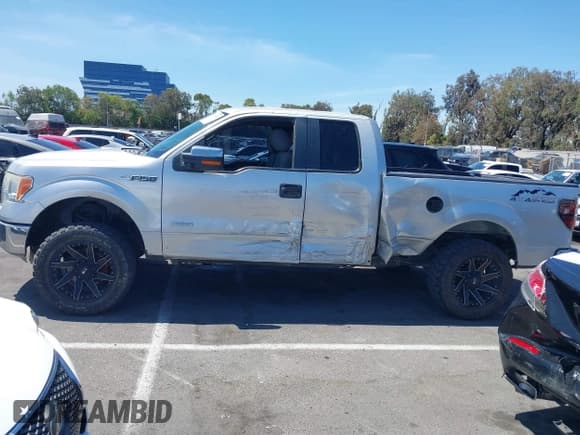 ✅ 2014 Ford F-150 XL • VIN: 1FTFX1ET4EFA77215 • Lot: 42698097. Listed on IAAI with 173,280 mi. Free auction sales archive from the USA and detailed vehicle history report at DreamBid. Image 14.