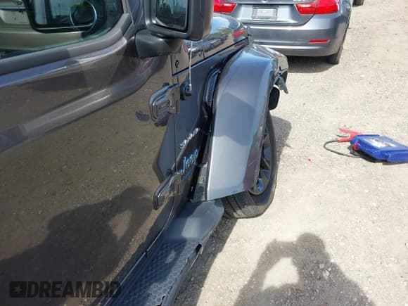 ✅ 2023 Jeep Wrangler Sahara • VIN: 1C4JJXP69PW684803 • Lot: 42214320. Listed on IAAI with 37,723 mi. Free auction sales archive from the USA and detailed vehicle history report at DreamBid. Image 19.