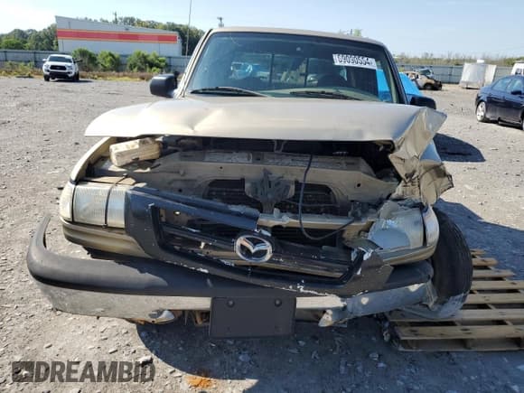 ✅ 2000 Mazda B-Series SE • VIN: 4F4YR16X2YTM09993 • Lot: 69090554. Wystawiony na Copart z przebiegiem 214 533 mil. Bezpłatny archiwum sprzedaży aukcyjnych z USA i szczegółowy raport historii pojazdu na DreamBid. Zdjęcie 5.