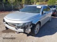 ✅ 2015 Chevrolet Impala LT • VIN: 2G1125S30F9108144 • Lot: 43450694. Listed on IAAI with 216,503 mi. Free auction sales archive from the USA and detailed vehicle history report at DreamBid. Image 2.