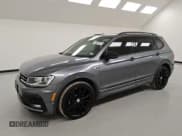 ✅ 2021 Volkswagen Tiguan SE • VIN: 3VV3B7AX2MM148487 • Lot: 87018305. Listed on Copart with 74,694 mi. Free auction sales archive from the USA and detailed vehicle history report at DreamBid. Image 1.