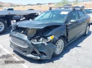 ✅ 2016 Ford Fusion S Hybrid • VIN: 3FA6P0UU2GR131952 • Lot: 42990600. Wystawiony na IAAI z przebiegiem 164 073 mil. Bezpłatny archiwum sprzedaży aukcyjnych z USA i szczegółowy raport historii pojazdu na DreamBid. Zdjęcie 6.