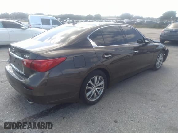 ✅ 2015 Infiniti Q50 Premium • VIN: JN1BV7AP8FM343805 • Lot: 41752314. Listed on IAAI with 69,231 mi. Free auction sales archive from the USA and detailed vehicle history report at DreamBid. Image 4.