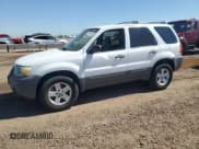 ✅ 2006 Ford Escape Hybrid • VIN: 1FMYU96H16KD50206 • Lot: 61869295. Listed on Copart with 106,090 mi. Free auction sales archive from the USA and detailed vehicle history report at DreamBid. Image 1.