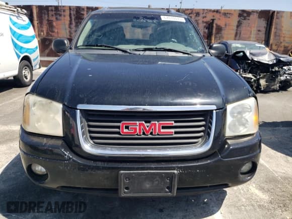 ✅ 2005 GMC Envoy SLE • VIN: 1GKES12S756201701 • Лот: 67016035. Опубликован ранее на Copart с пробегом Не указан. Бесплатный доступ к архиву аукционных продаж из США и подробный отчёт об истории автомобиля на DreamBid. Изображение 5.