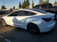 ✅ 2020 Tesla Model 3 Standard Range Plus • VIN: 5YJ3E1EAXLF738190 • Лот: 87244375. Опубликован ранее на Copart с пробегом 58 971 миль. Бесплатный доступ к архиву аукционных продаж из США и подробный отчёт об истории автомобиля на DreamBid. Изображение 2.