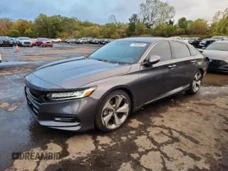 ✅ 2019 Honda Accord Touring • VIN: 1HGCV2F91KA033152 • Lot: 86450885. Listed on Copart with 101,972 mi. Free auction sales archive from the USA and detailed vehicle history report at DreamBid. Image 1.