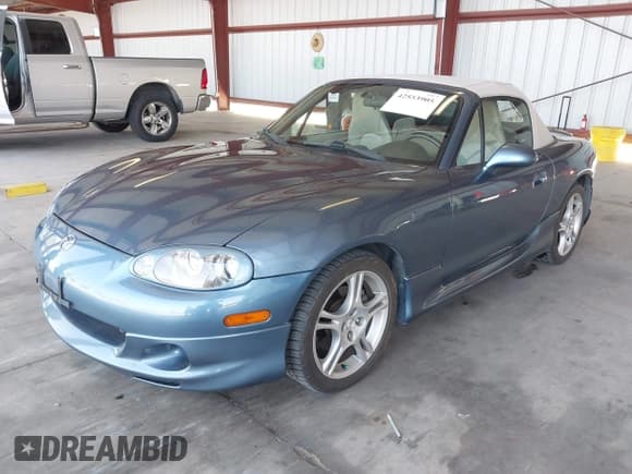 ✅ 2005 Mazda MX-5 Miata LS • VIN: JM1NB353350412960 • Lot: 42553905. Wystawiony na IAAI z przebiegiem 128 148 mil. Bezpłatny archiwum sprzedaży aukcyjnych z USA i szczegółowy raport historii pojazdu na DreamBid. Zdjęcie 2.