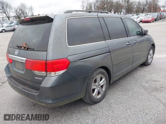 ✅ 2010 Honda Odyssey Touring • VIN: 5FNRL3H94AB044475 • Лот: 43793924. Опубликован ранее на IAAI с пробегом 155 483 миль. Бесплатный доступ к архиву аукционных продаж из США и подробный отчёт об истории автомобиля на DreamBid. Изображение 4.