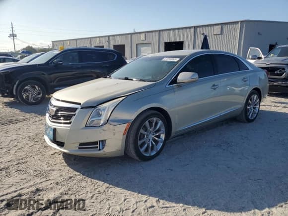 ✅ 2016 Cadillac XTS Premium Collection • VIN: 2G61P5S30G9117973 • Lot: 61818065. Wystawiony na Copart z przebiegiem 107 854 mil. Bezpłatny archiwum sprzedaży aukcyjnych z USA i szczegółowy raport historii pojazdu na DreamBid. Zdjęcie 1.