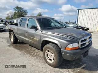 2001 Dodge Dakota Sport z VIN 1B7HG2AN91S333999, wystawiony jako Copart lot #73388754 z przebiegiem 202 759 mil mil oraz Szkoda całkowita • Salvage title. Historia ofert i sprzedaży dostępna na DreamBid. Obrazek 4.