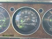 ✅ 1985 Jeep Grand Wagoneer • VIN: 1JCNJ15N2FT065788 • Lot: 43704149. Wystawiony na IAAI z przebiegiem 160 952 mil. Bezpłatny archiwum sprzedaży aukcyjnych z USA i szczegółowy raport historii pojazdu na DreamBid. Zdjęcie 7.