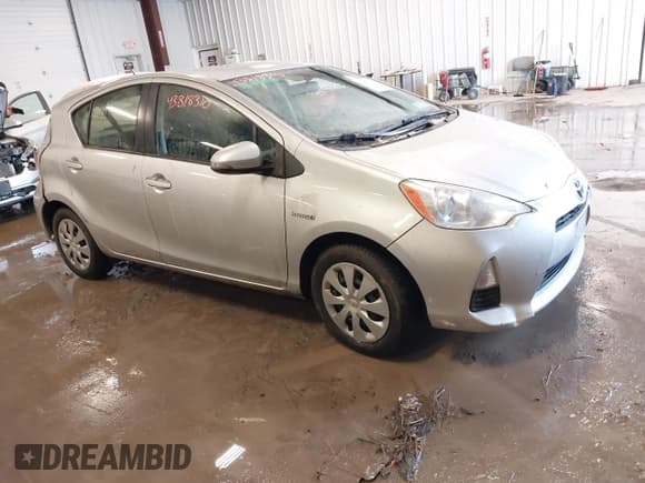 ✅ 2014 Toyota Prius Two • VIN: JTDKDTB37E1570181 • Lot: 43818310. Listed on IAAI with 155,531 mi. Free auction sales archive from the USA and detailed vehicle history report at DreamBid. Image 1.