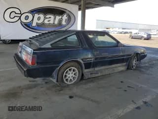 ✅ 1983 Mitsubishi Starion • VIN: JA3BC4475DZ501951 • Lot: 56437555. Listed on Copart with 75,427 mi. Free auction sales archive from the USA and detailed vehicle history report at DreamBid. Image 3.