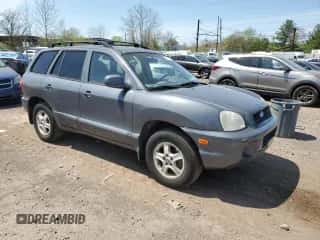 2001 Hyundai Santa Fe GLS с VIN KM8SC83D41U069325, выставлен на аукционе Copart как лот 54377815 с пробегом 51 574 миль миль и Чистый • Clean title. История ставок и продаж доступна на DreamBid. Изображение 4.