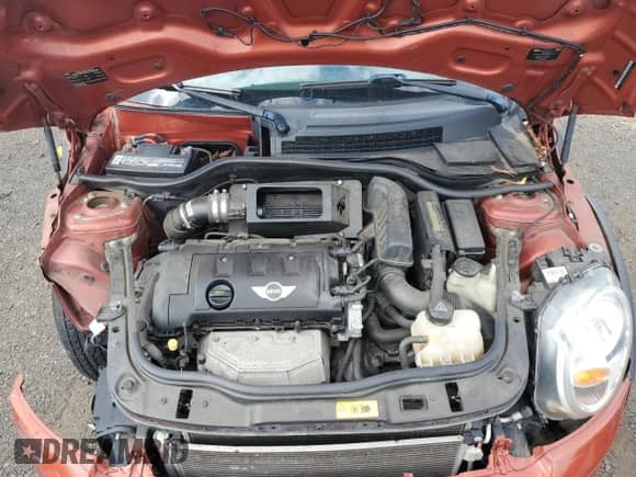 2012 MINI Hardtop with VIN WMWSU3C53CT260060, listed as a Copart auction lot 63656395 with 100,537 mi miles and Clean title. Bid and sale history available at DreamBid. Image 11.