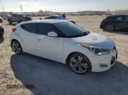 ✅ 2012 Hyundai Veloster w/Red Int • VIN: KMHTC6AD8CU054079 • Lot: 77586954. Wystawiony na Copart z przebiegiem Nie podano. Bezpłatny archiwum sprzedaży aukcyjnych z USA i szczegółowy raport historii pojazdu na DreamBid. Zdjęcie 4.