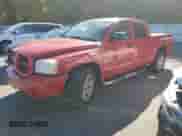 2007 Dodge Dakota SLT z VIN 1D7HW48N57S103881, wystawiony jako Copart lot #75803604 z przebiegiem 194 688 mil mil oraz Szkoda całkowita • Salvage title. Historia ofert i sprzedaży dostępna na DreamBid. Obrazek 1.
