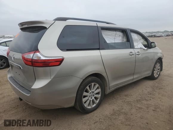 ✅ 2015 Toyota Sienna Limited • VIN: 5TDDK3DC4FS102487 • Lot: 66174025. Listed on Copart with 96,676 mi. Free auction sales archive from the USA and detailed vehicle history report at DreamBid. Image 3.