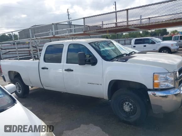 ✅ 2009 Chevrolet Silverado 2500HD Work Truck • VIN: 1GCHC43K79F113467 • Лот: 43400959. Опубликован ранее на IAAI с пробегом 337 659 миль. Бесплатный доступ к архиву аукционных продаж из США и подробный отчёт об истории автомобиля на DreamBid. Изображение 13.