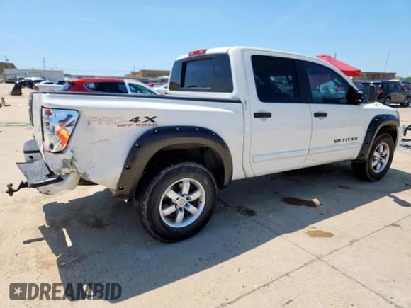 ✅ 2011 Nissan Titan Pro-4X • VIN: 1N6BA0EC0BN301945 • Лот: 58733695. Опубликован ранее на Copart с пробегом 205 752 миль. Бесплатный доступ к архиву аукционных продаж из США и подробный отчёт об истории автомобиля на DreamBid. Изображение 3.