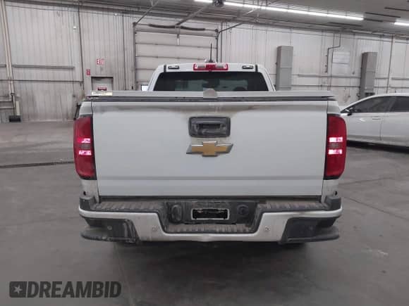 2020 Chevrolet Colorado 4WD LT z VIN 1GCHTCEA7L1180802, wystawiony jako IAAI lot #41488428 z przebiegiem 94 430 mil mil oraz . Historia ofert i sprzedaży dostępna na DreamBid. Obrazek 17.