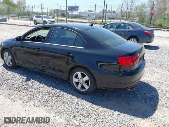 ✅ 2014 Volkswagen Jetta TDI w/Premium/Nav • VIN: 3VWLL7AJXEM435467 • Lot: 42056011. Listed on IAAI with 167,534 mi. Free auction sales archive from the USA and detailed vehicle history report at DreamBid. Image 3.